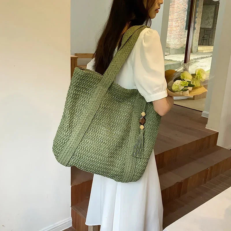 Elegante bolso tejido de paja