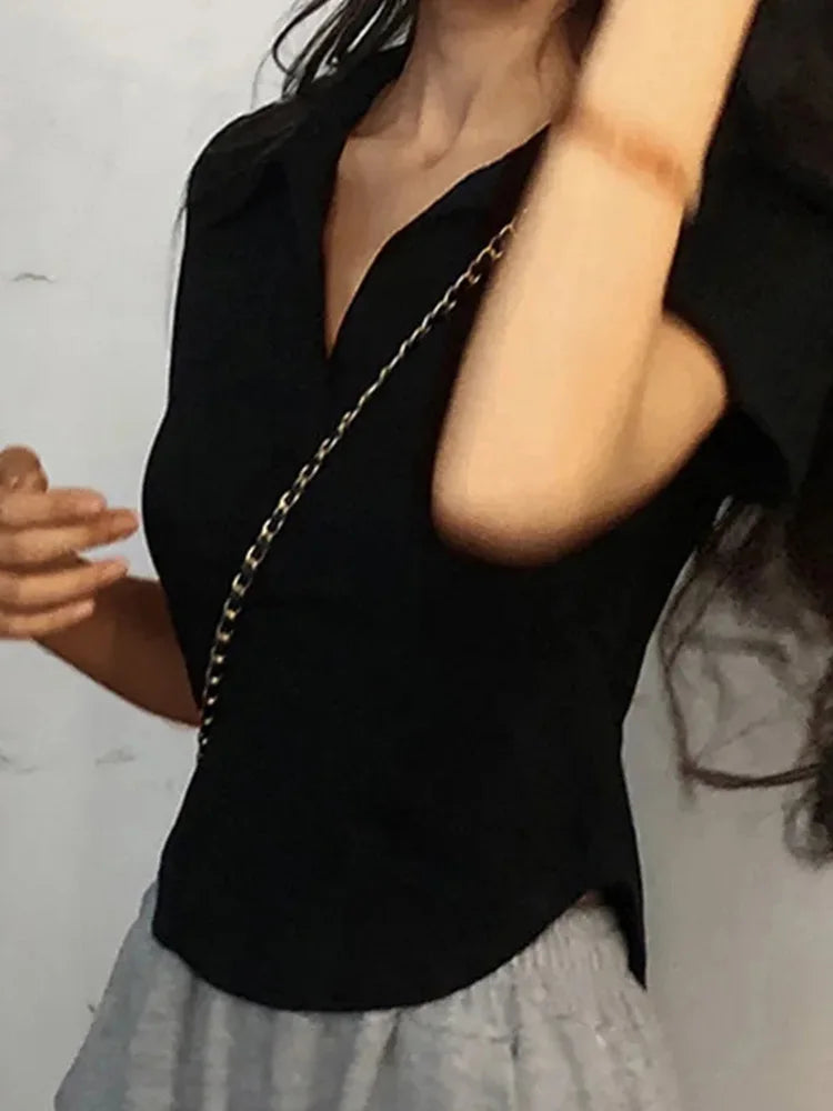 Top de solapa de manga corta