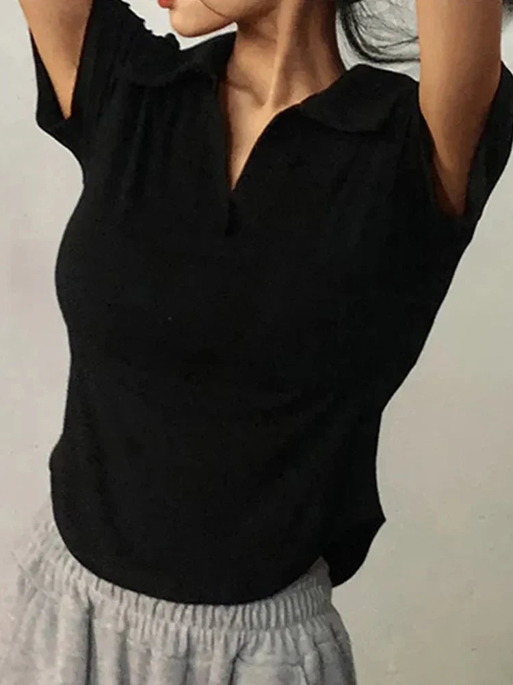 Top de solapa de manga corta